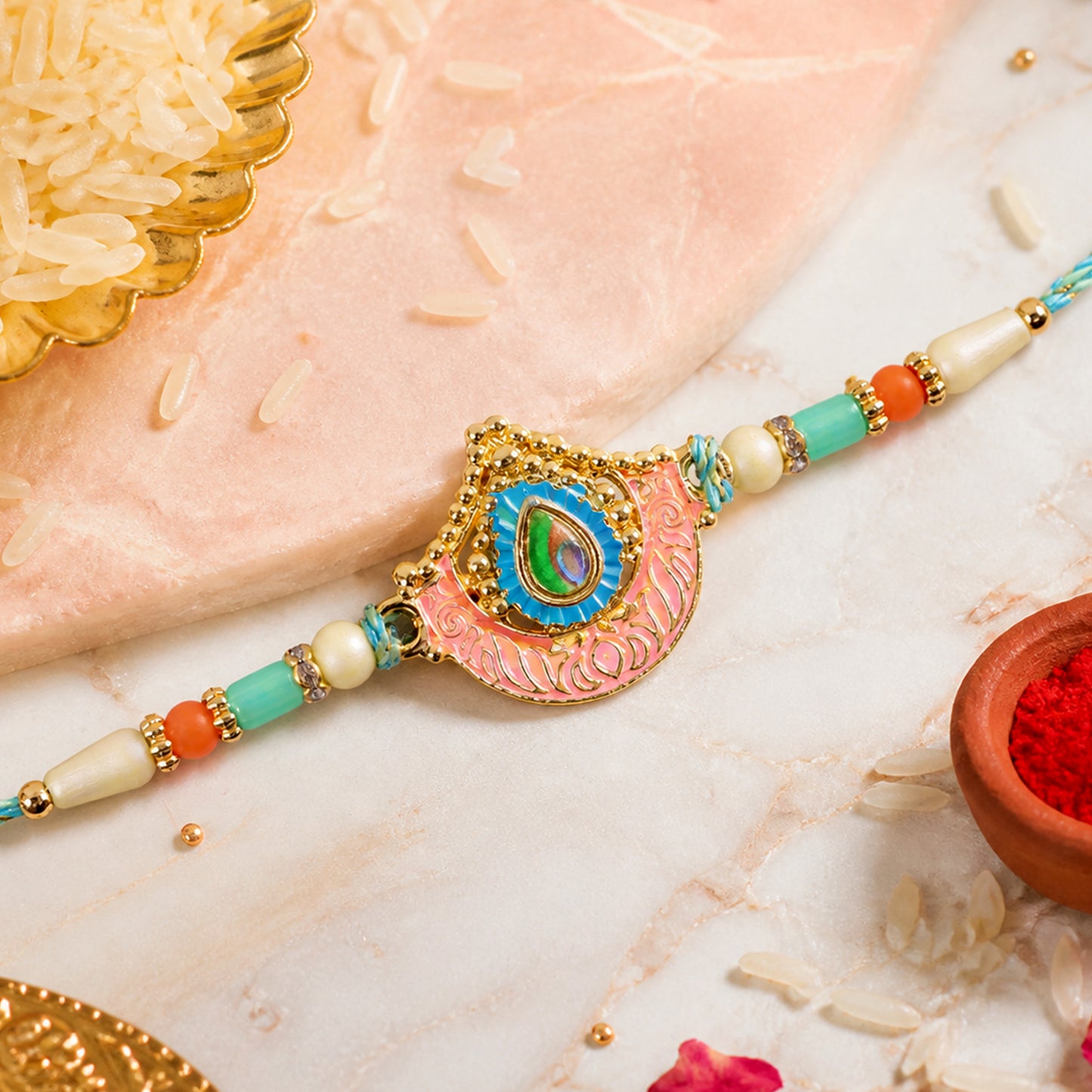 Peacock Feather Crown Pendant Rakhi with Pink Enamel