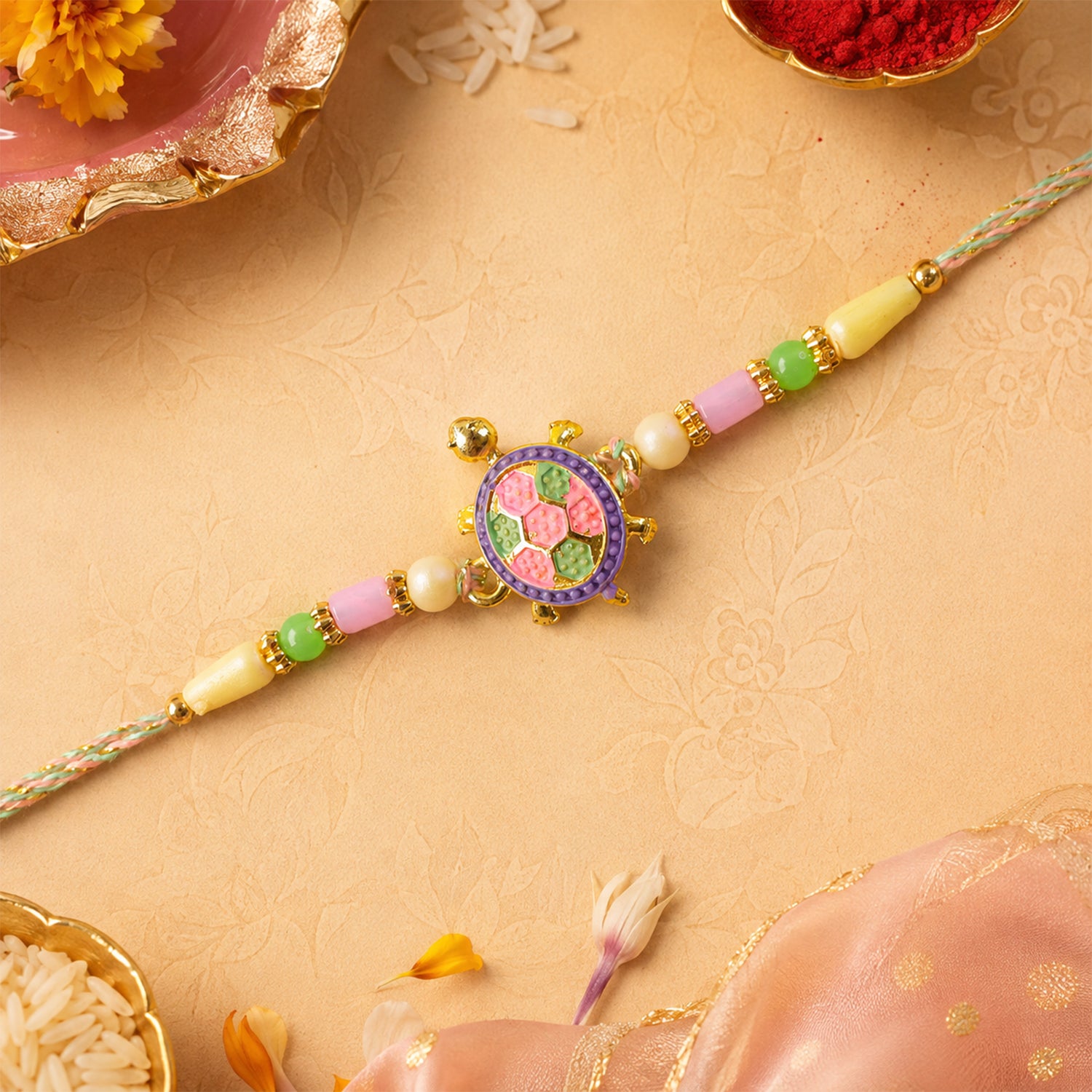 Enamel Tortoise Pendant Rakhi with Pastel Beads