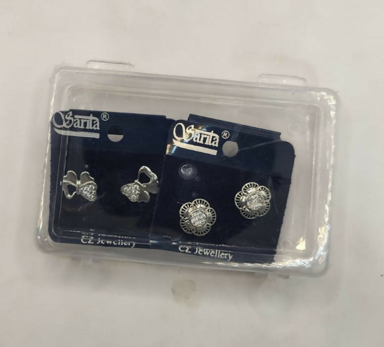 Packaging box for silver plated cubic zirconia stud earrings set with bow and flower designs