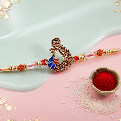 Designer Rakhi with Peacock Paisley Charm, blue stones and thread look for Gift Use