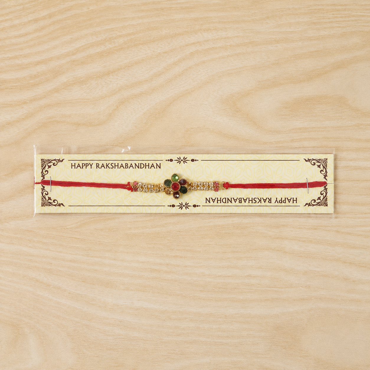 Multicolour Floral Kundan Rakhi with Red Green Center and Crystal Line
