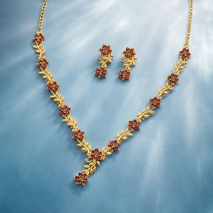 Everlasting Bloom V-Necklace with Ruby Floral Design and Elegant Gold Detailing