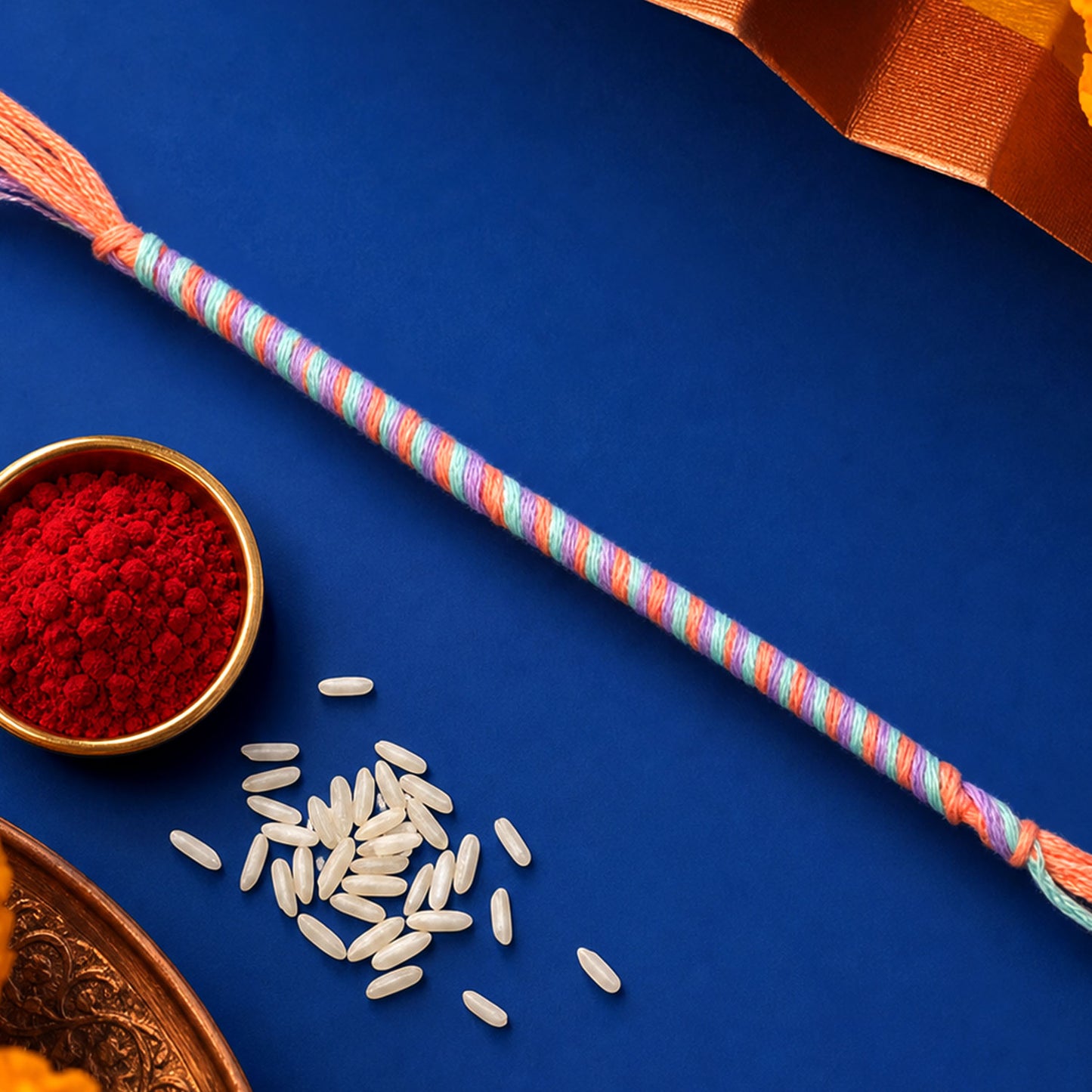Blue-Pink-Orange Twisted Cord Rakhi with Beadless Minimal Design