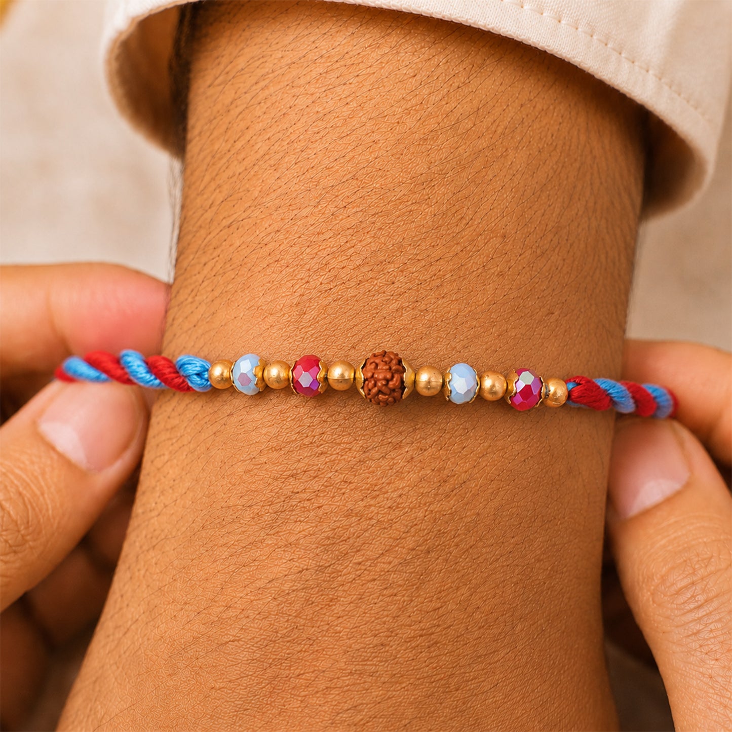Beautiful Multicolor Designer Rakhi with Golden Centre and Cheerful Raksha Bandhan Style