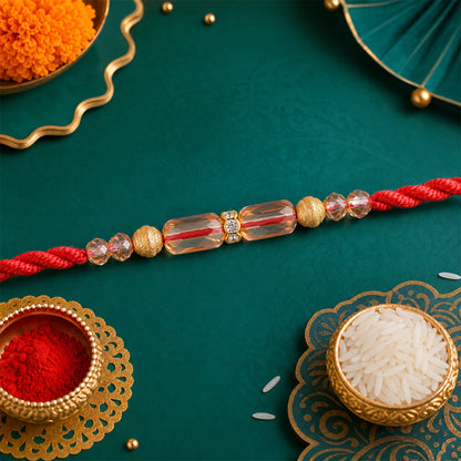 Red Thread Rakhi with Crystal Bead Pendant and Golden Bead Accents