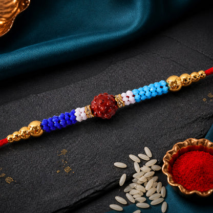 Blue Red Beaded Rakhi with Gold Accents and Classic Festive Brother Gift Appeal Ideas