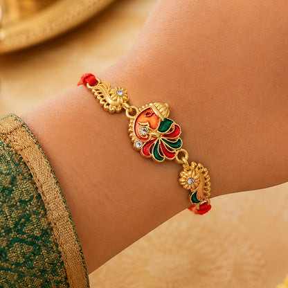 Gold-Toned Lord Ganesha Rakhi with Multicolor Enamel, Crystal Accents & Designer Red Thread