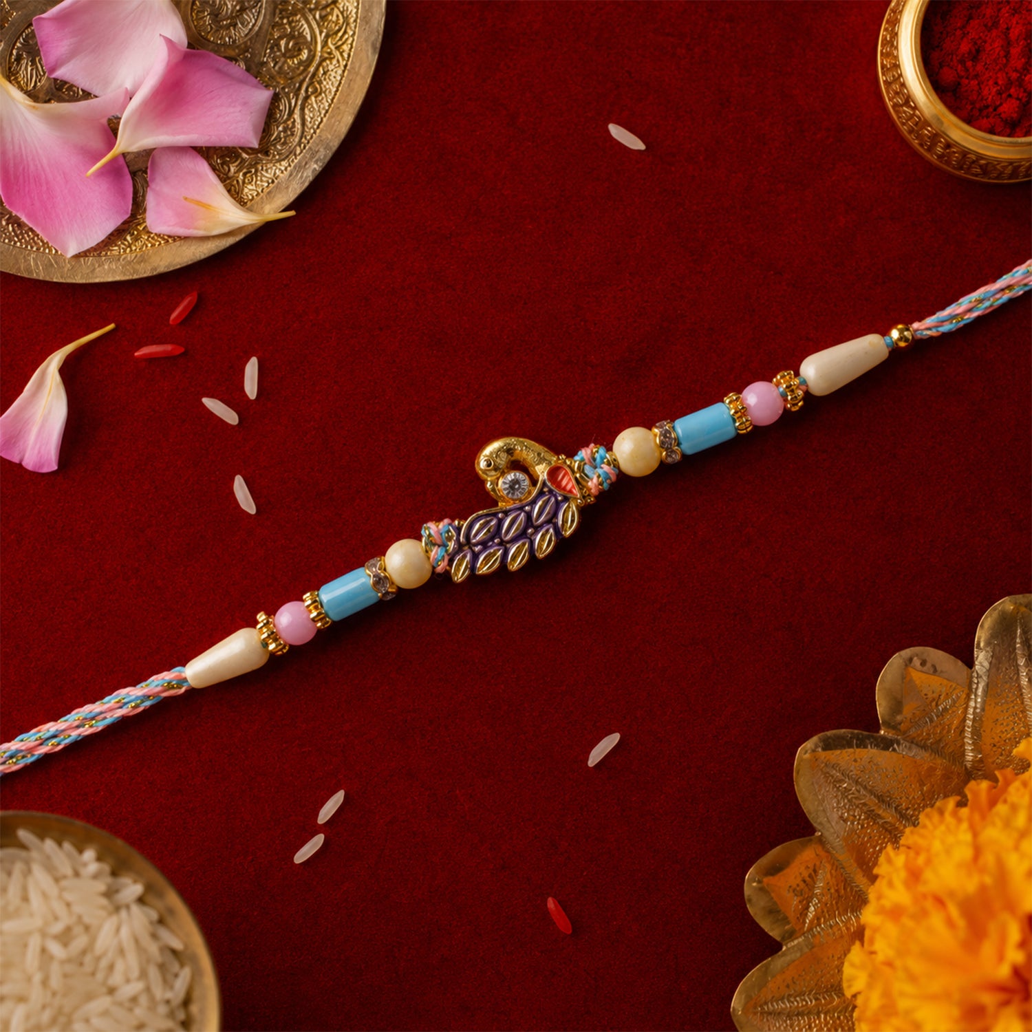 Blue Enamel Peacock Pendant Rakhi with Pastel Beads