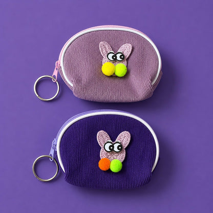 Portable mini coin pouch with soft fabric texture