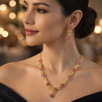 Everlasting Bloom V-Necklace with Ruby Floral Design and Elegant Gold Detailing