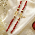 Divine Gold-Plated "Bhaiya & Bhabhi" Oval Frame Rakhi Set with Sacred Rudraksha