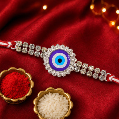 Premium Rakhi showcasing Evil Eye Charm, leaf touch and thread look for Gift Use