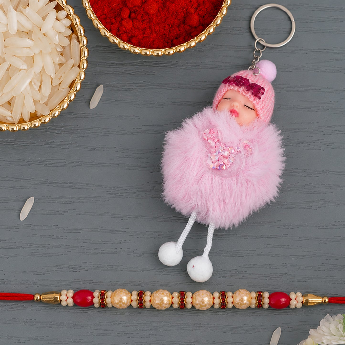 Goden Floral Pearl Beads Crystal Designer Rakhi with Cute Doll Keychain Combo (2 Pc)