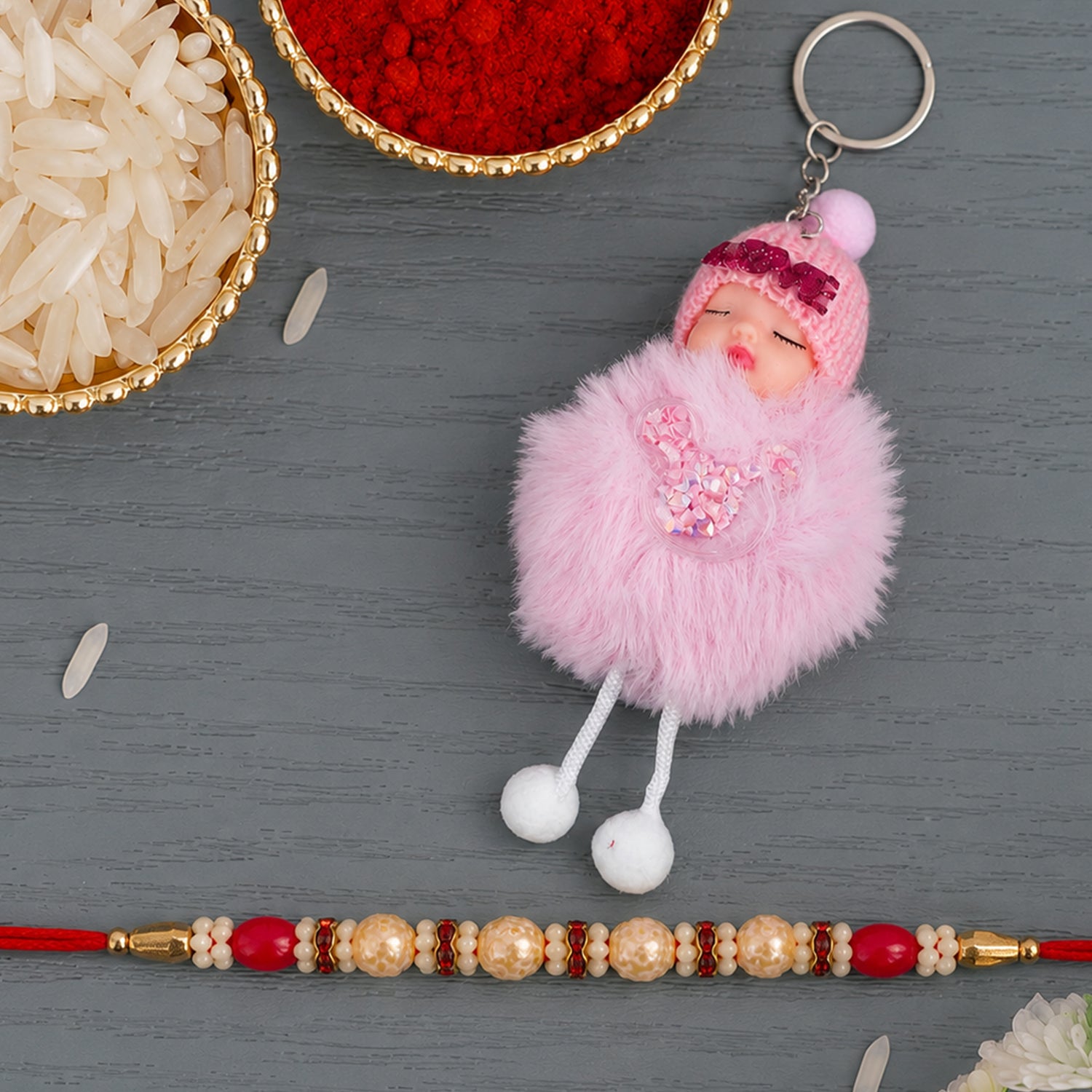 Goden Floral Pearl Beads Crystal Designer Rakhi with Cute Doll Keychain Combo (2 Pc)
