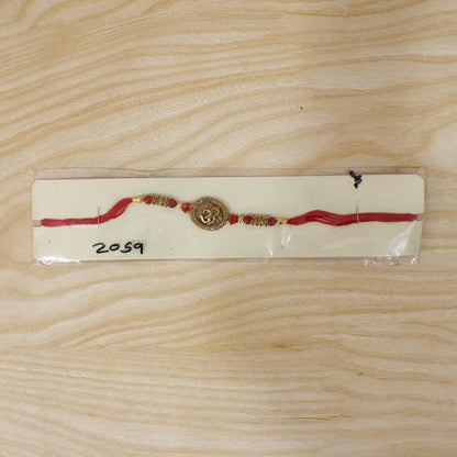 Antique Om Coin Rakhi with Rudraksha Beads and Red Thread