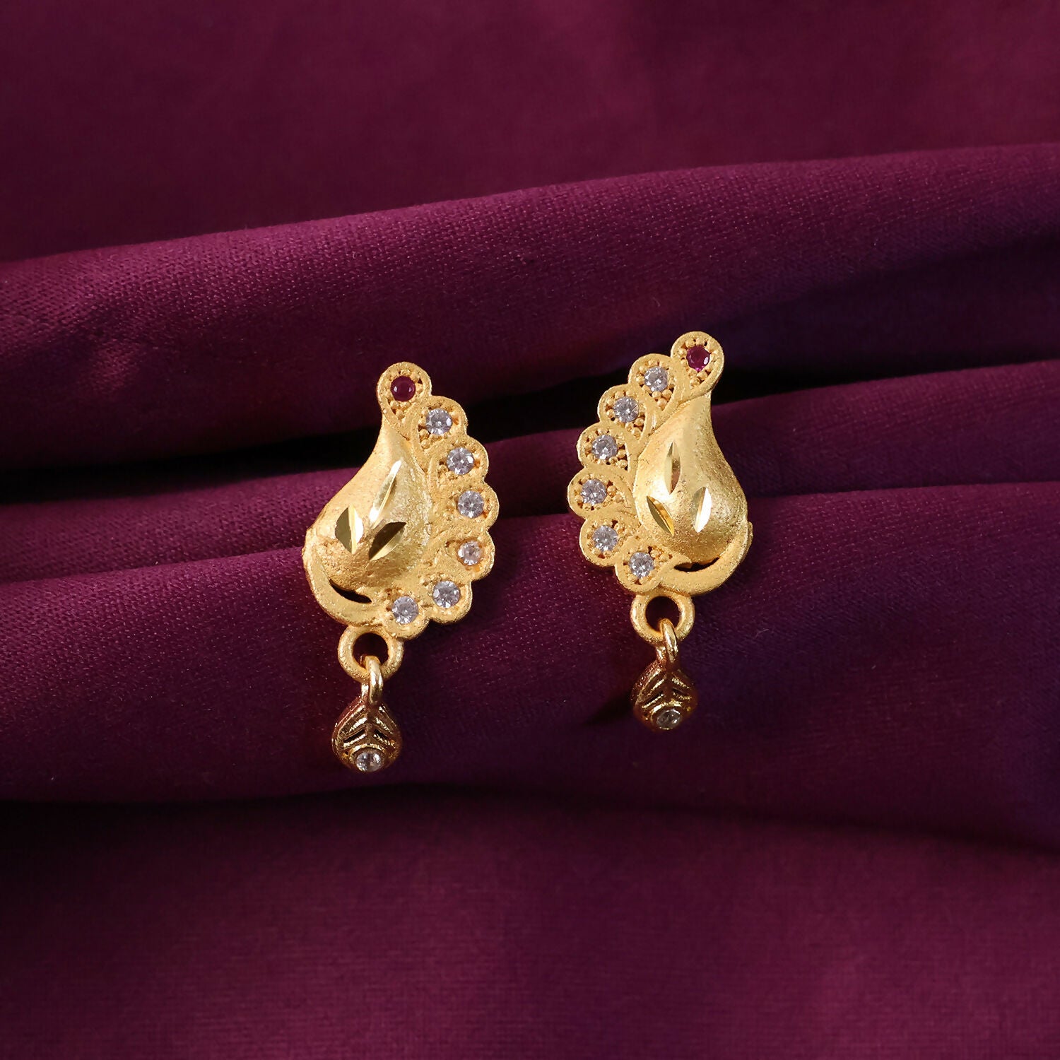 Peacock Inspired Gold Finish Earrings With Textured Motif And Stone Drop Accent