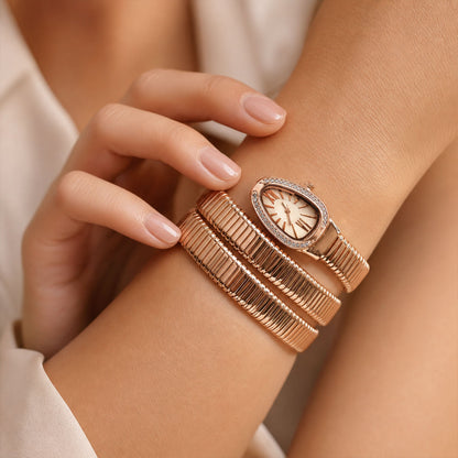 Rose Gold Oval Snake Style Bracelet Watch with Crystal Dial Border Design