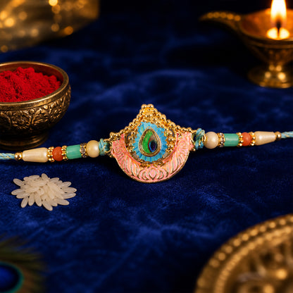 Peacock Feather Crown Pendant Rakhi with Pink Enamel