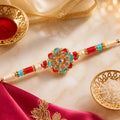 Festive Rakhi with Floral Rosette and crystal accents in bead line for Raksha Bandhan