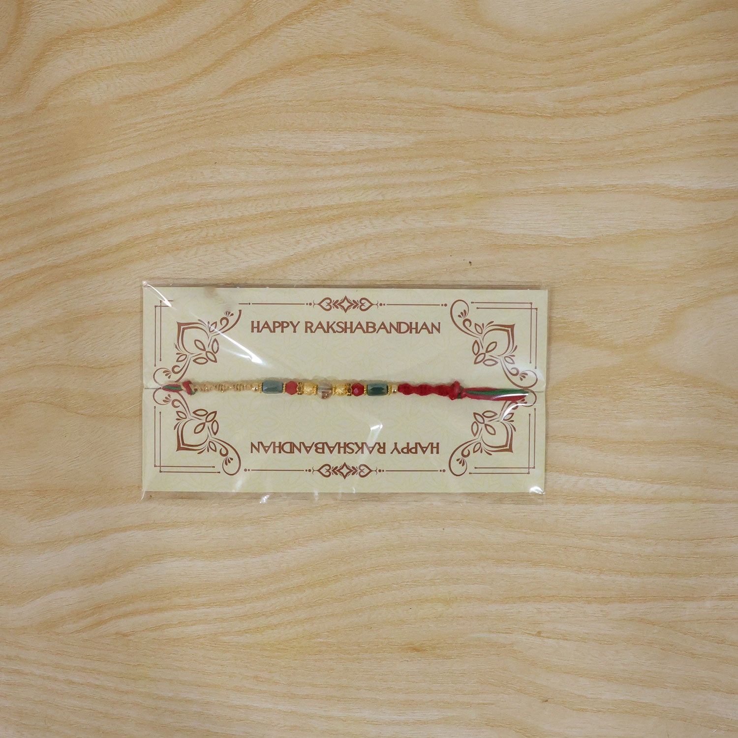 Beautiful Pearl Bead Rakhi with Soft Festive Shades and Elegant Designer Look