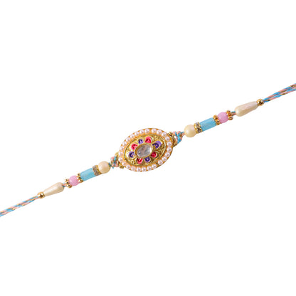 Pearl Bordered Oval Kundan Pendant Rakhi with Pastel Beads