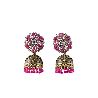 Detailed shot of pink beads and antique gold jhumka dome