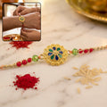 Gold Blue Flower Rakhi – Elegant sibling festival accessory