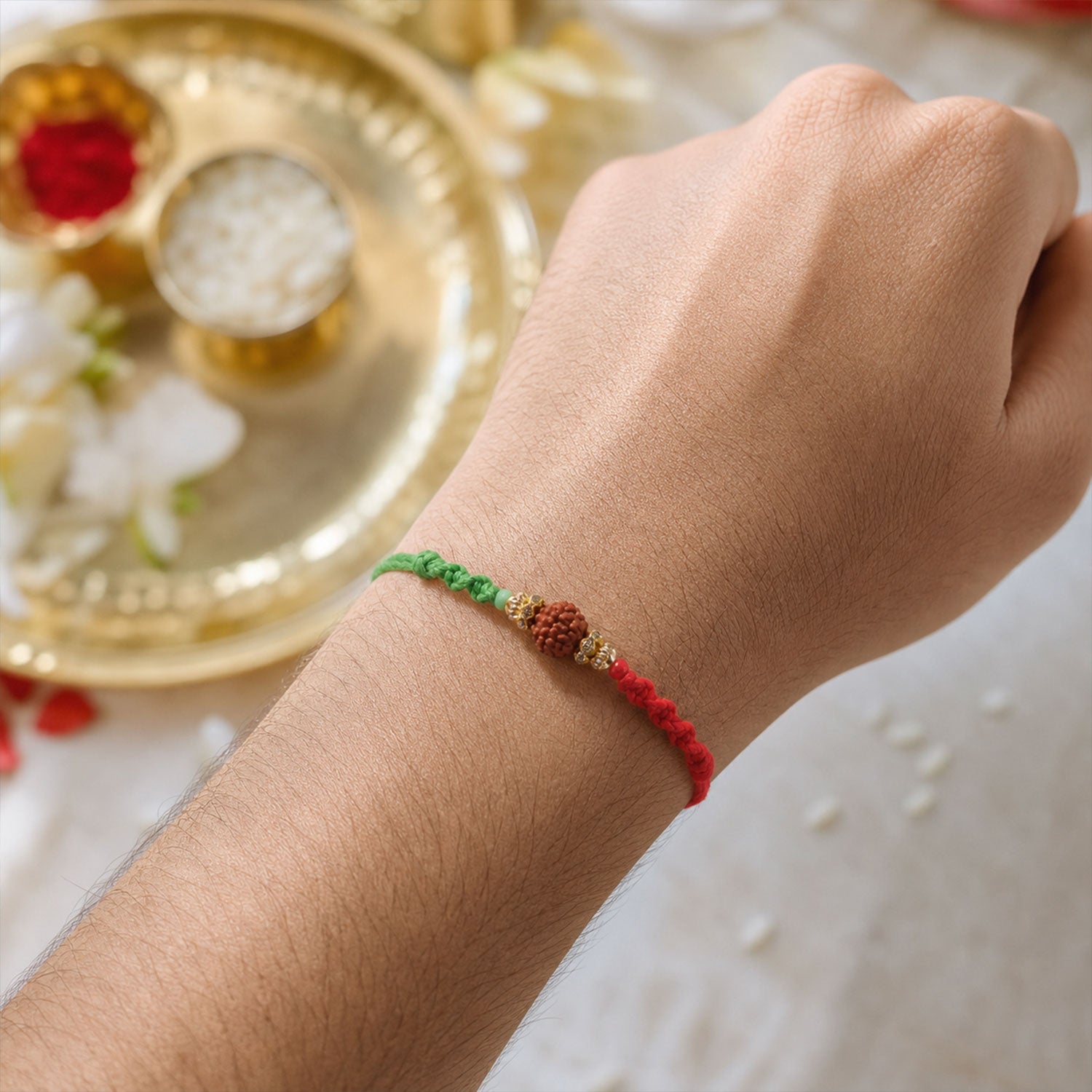Green Thread Rakhi with Natural Rudraksha Bead and Golden Caps