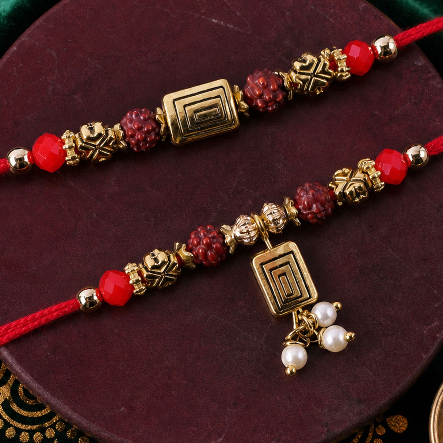 Rudraksha Geometric Rakhi Set with Pearl Lumba Charm for Festive Couple Gift Giving