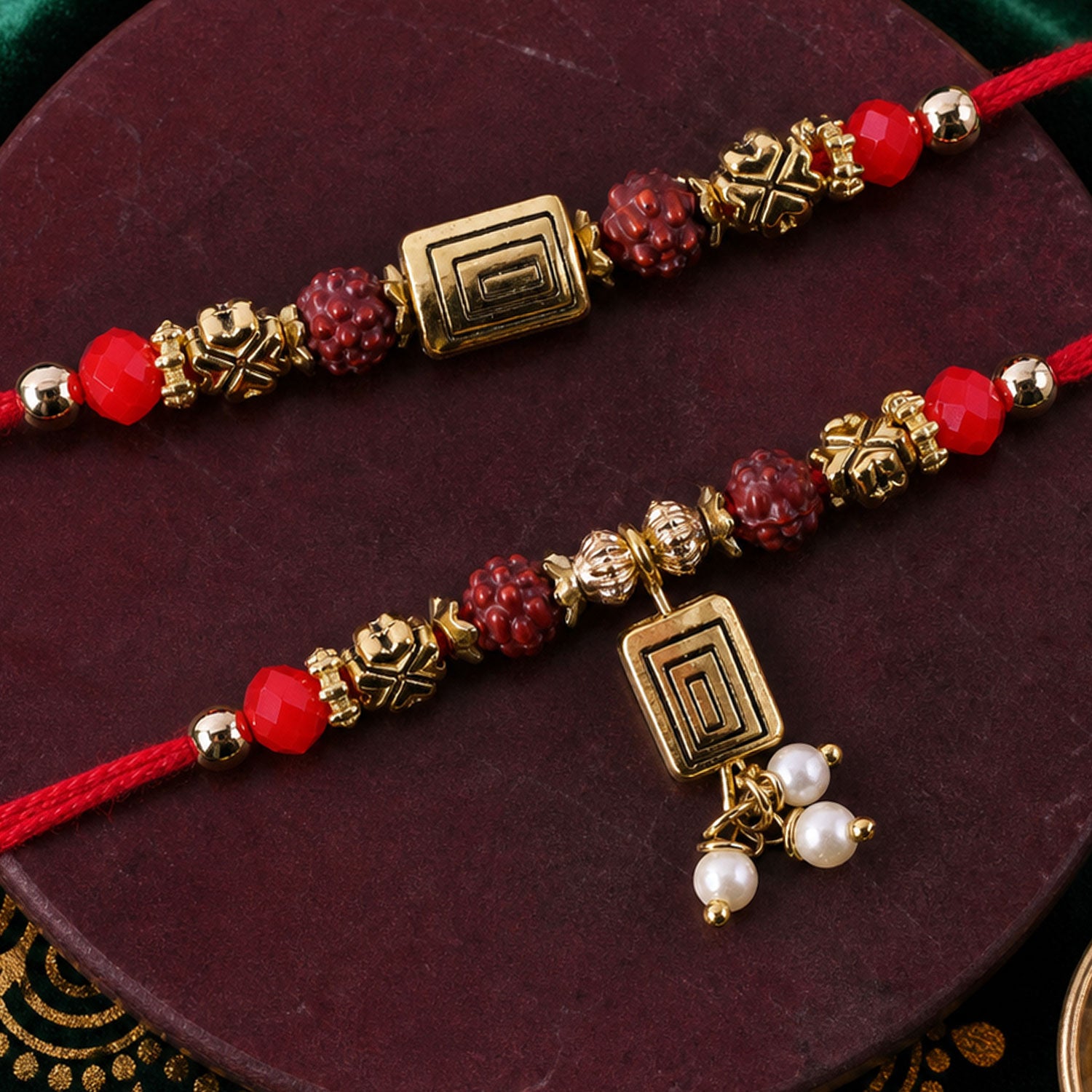 Rudraksha Geometric Rakhi Set with Pearl Lumba Charm for Festive Couple Gift Giving