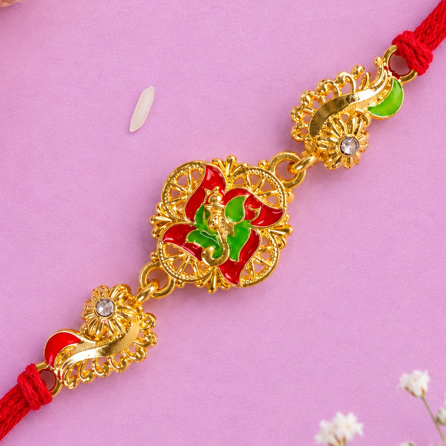 Ornate Rakhi featuring Floral Medallion, multicolor stones and gift style for Gift