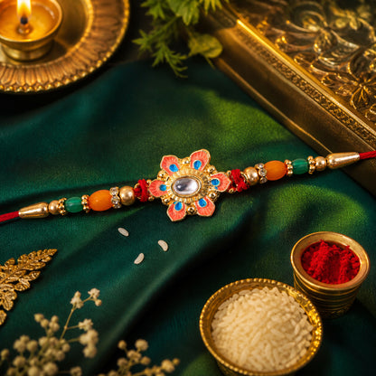 Orange and Teal Floral Kundan Pendant Rakhi with Pastel Beads