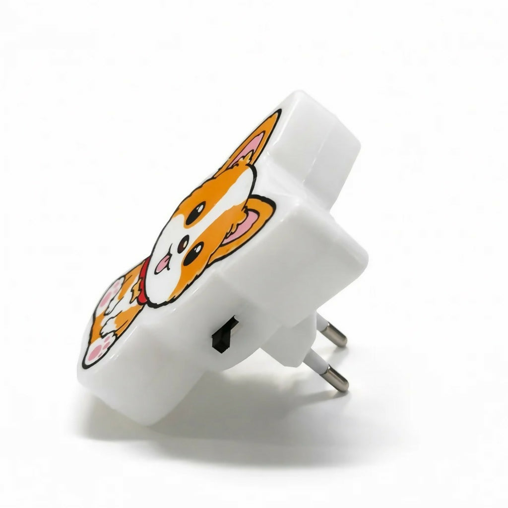 Side angle of dog plug-in night lamp illuminating softly