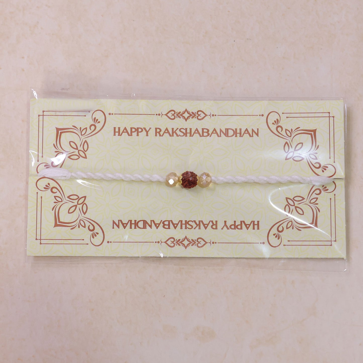 White-Red Thread Rakhi with Rudraksha and Sparkling Crystal Bead