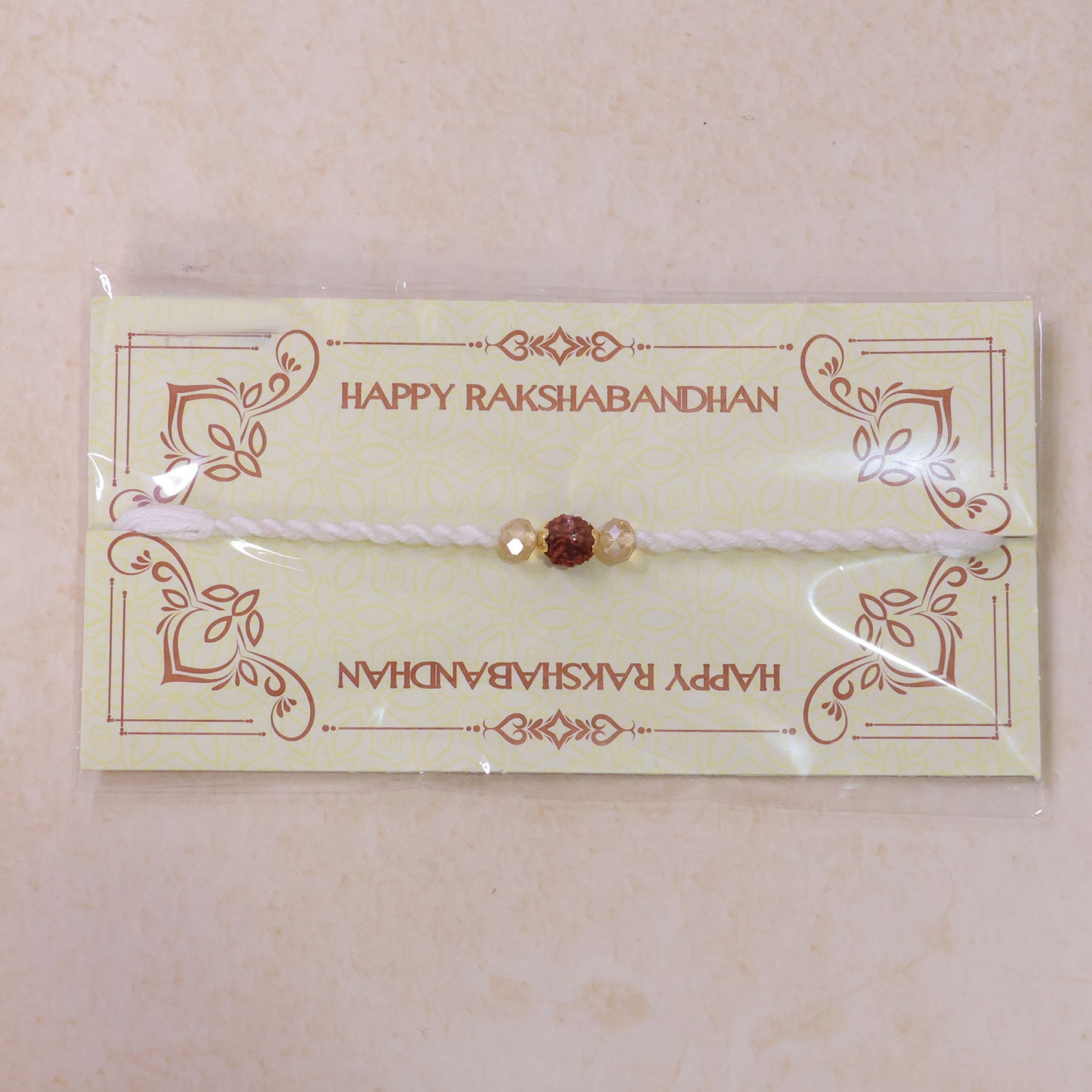 White-Red Thread Rakhi with Rudraksha and Sparkling Crystal Bead