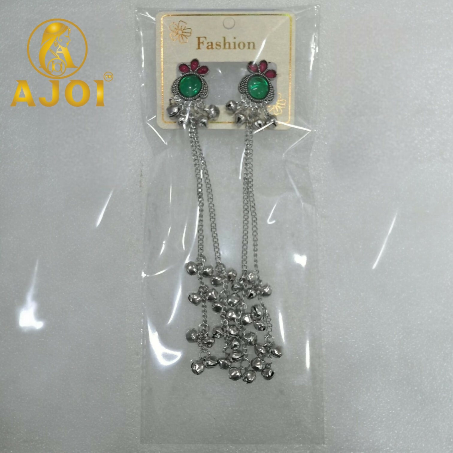 Side view showcasing length and ghungroo musical charms of earrings