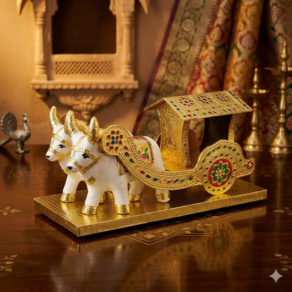 Meenakari bullock cart placed on desk for home decor