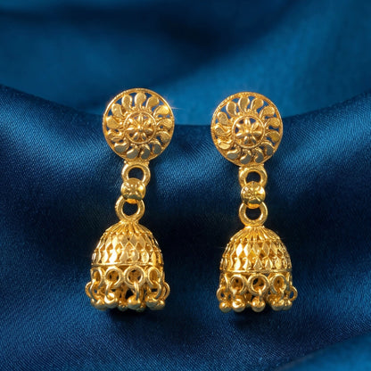 Side view of gold jhumka earrings showcasing detailed design
