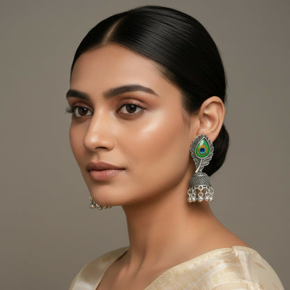 Oxidised Silver Jhumka Earrings Designed With Elegant Peacock Feather