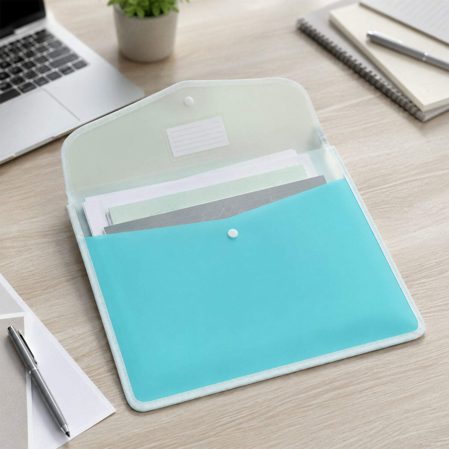 Pastel expandable folder displaying dual-tone colors and stitched edges