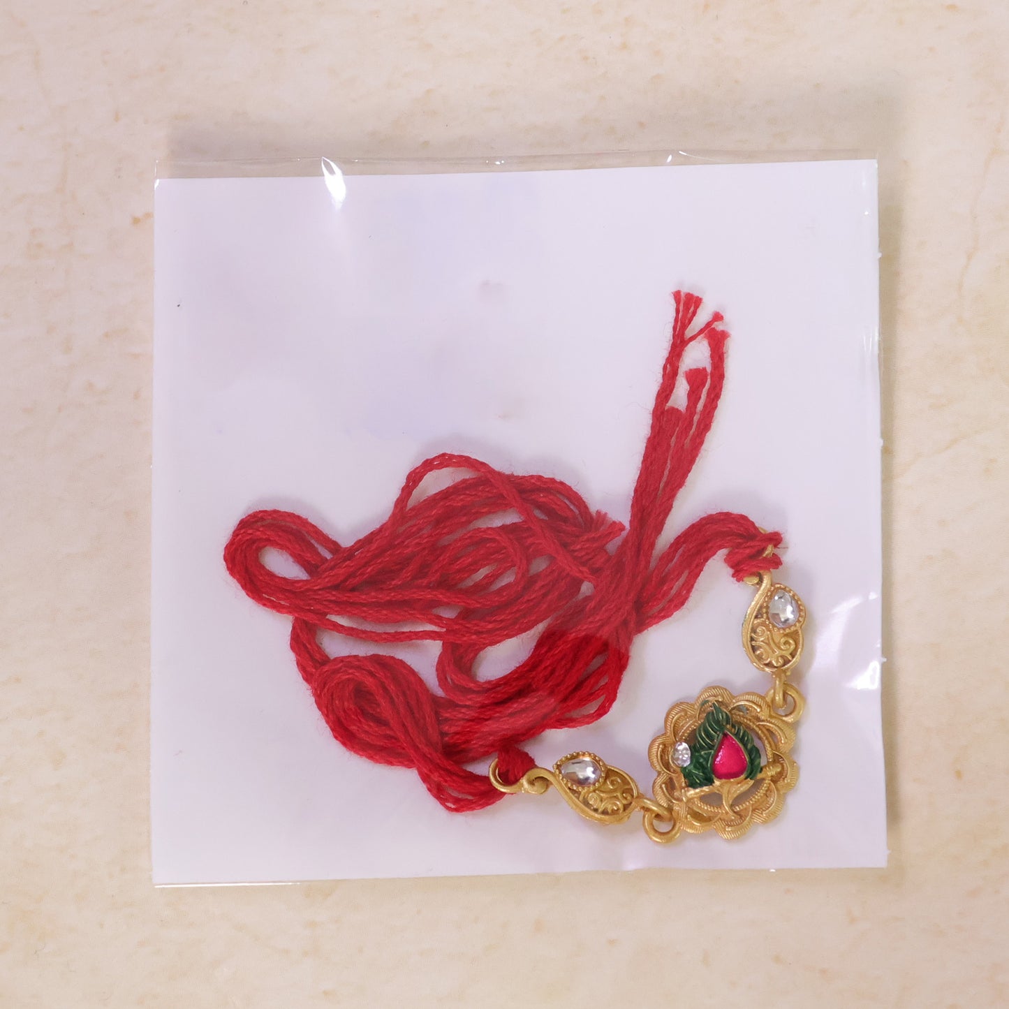 Classic Rakhi with Shri Plaque, ornate work and thread style for Festive Display
