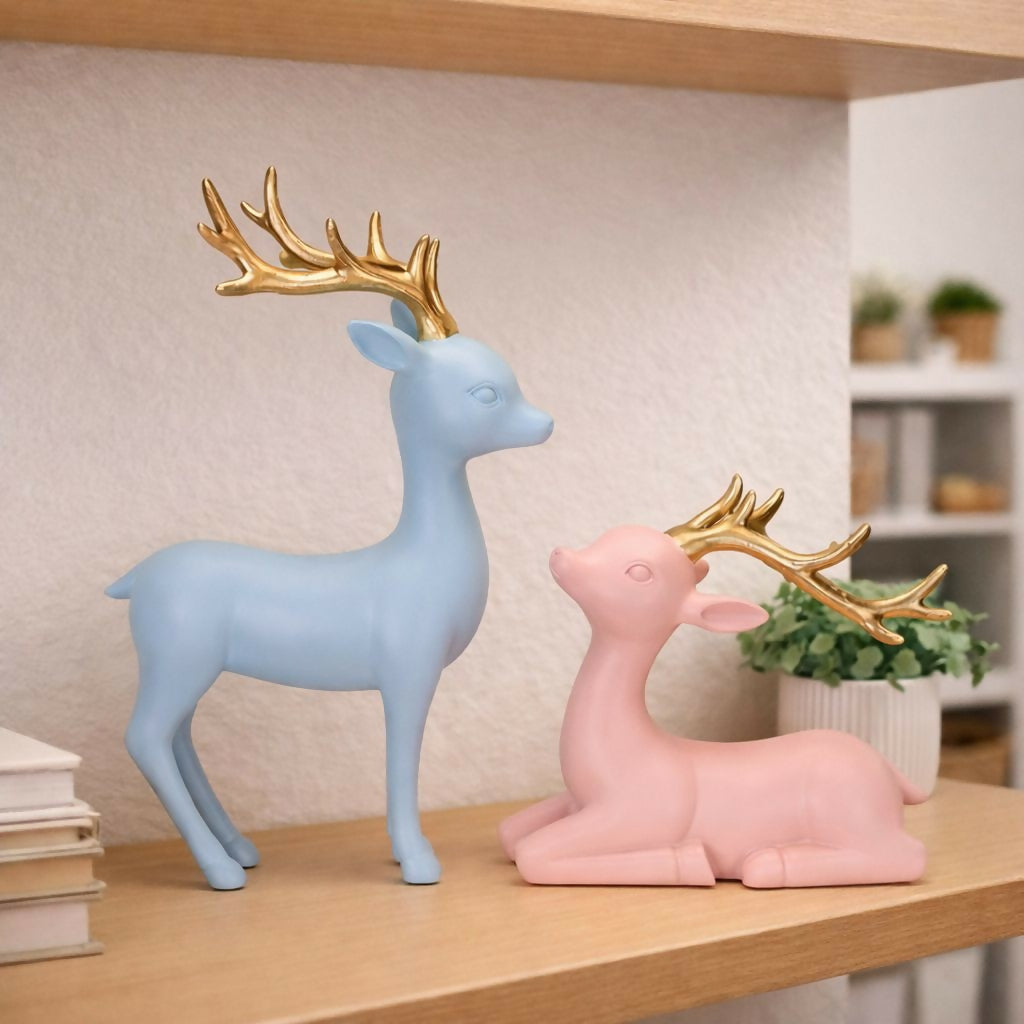 Standing pastel deer figurine with golden antlers