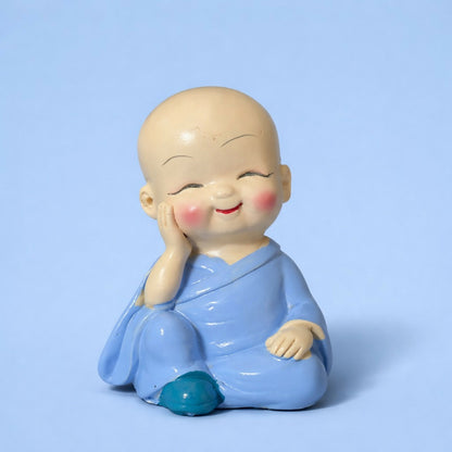 Close-up of Smiling Monk Baby Buddha figurine face