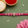 Pink Beaded Rakhi with Rose-Toned Sparkling Crystal Stones