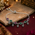 Vintage-Inspired Oxidized Silver Bolo Bracelet with Alternate Maroon and Green Stone Connectors and Textured Pineapple Dangles