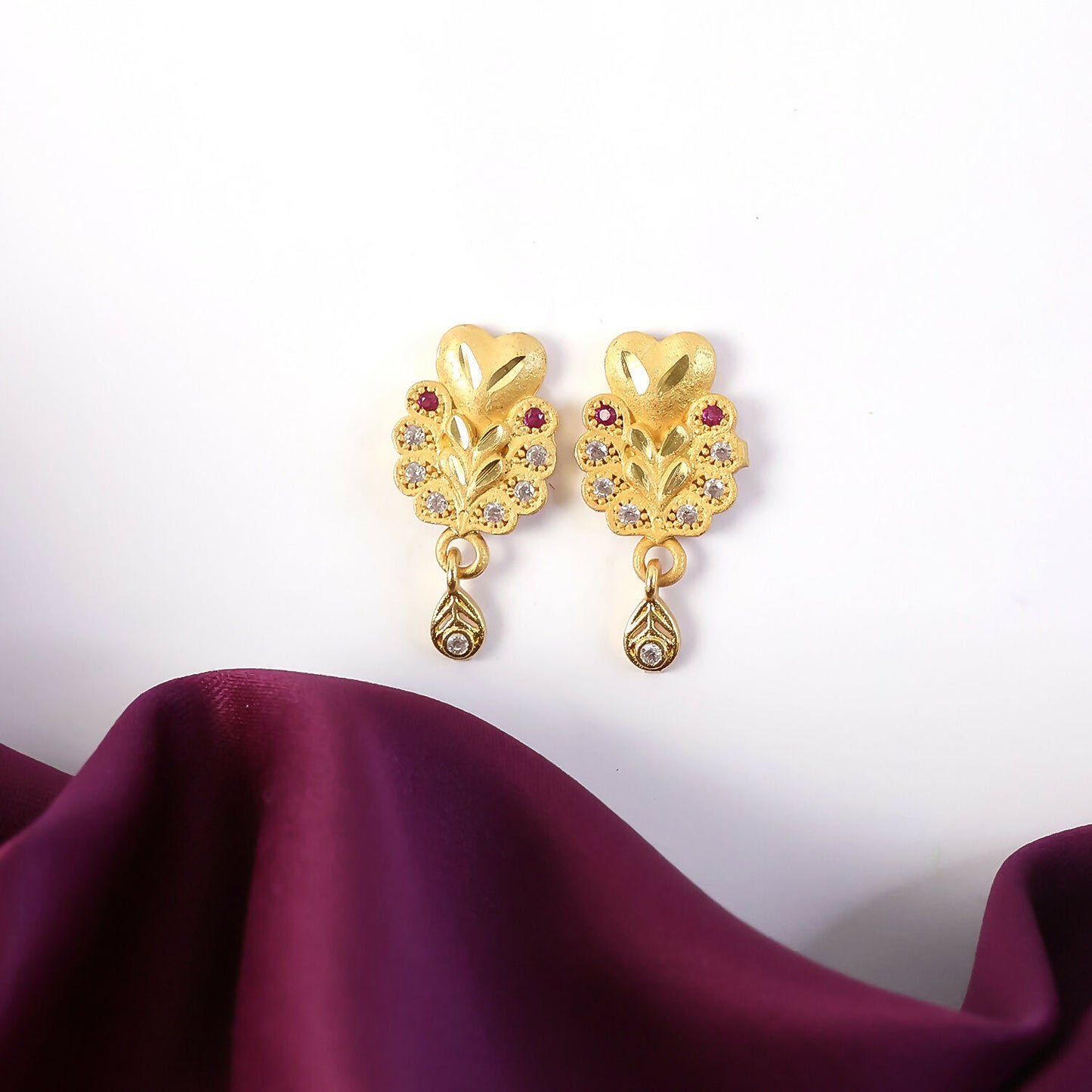 Floral Inspired Gold Stud Earrings With Central Stone And Teardrop Dangle Detail
