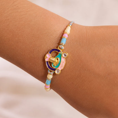 Meenakari Round Pendant Rakhi with Pastel Beads