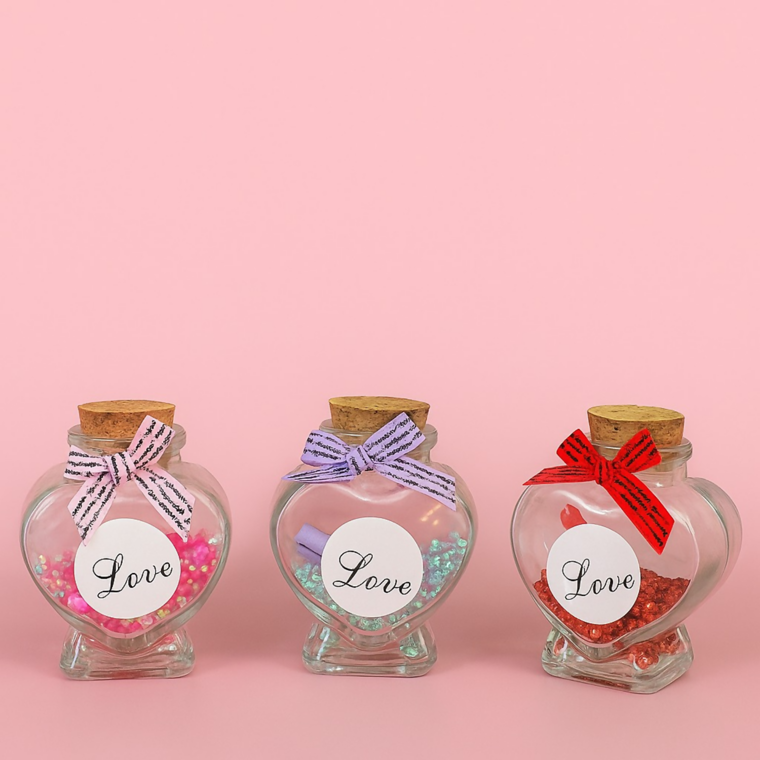 Heart Shaped Love Message Glass Bottles with Cork Lid – Set of 3 (Red, Pink & Blue) | Glitter Filled Decorative Bottles with Mini Scroll Notes | Romantic Gift Jars for Valentine’s Day, Anniversary, Birthday & Home Decor