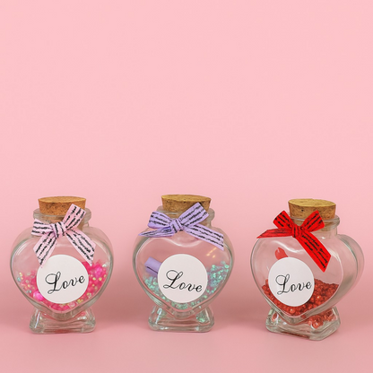 Heart Shaped Love Message Glass Bottles with Cork Lid – Set of 3 (Red, Pink & Blue) | Glitter Filled Decorative Bottles with Mini Scroll Notes | Romantic Gift Jars for Valentine’s Day, Anniversary, Birthday & Home Decor