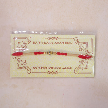 Red Twisted Cord Rakhi with a Colourful Enamel Bead and Gold Accents